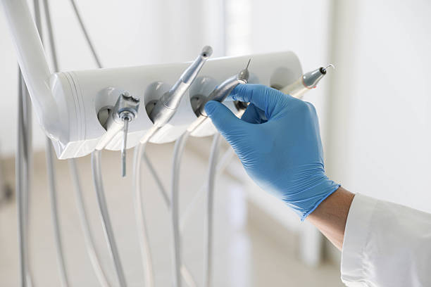 Professional Tooth Extraction technician working in East Hampton North, NY
